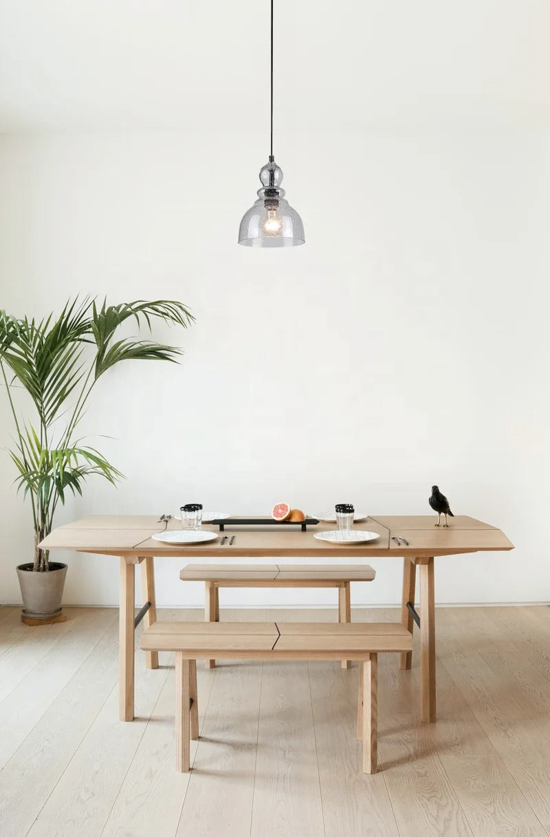 Black pendant lamp with clear rounded glass shade