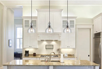 Black pendant lamp with clear rounded glass shade