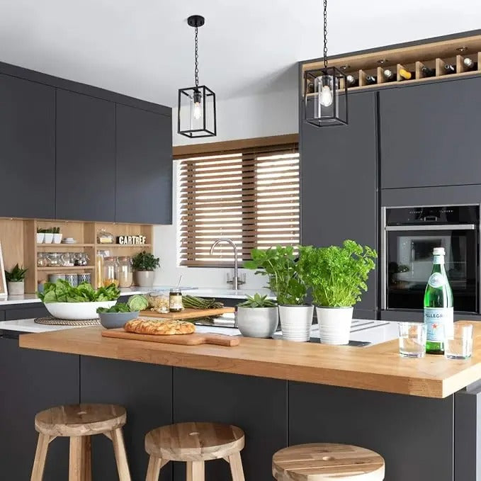 Black pendant lamp with open frame and inner glass cylinder
