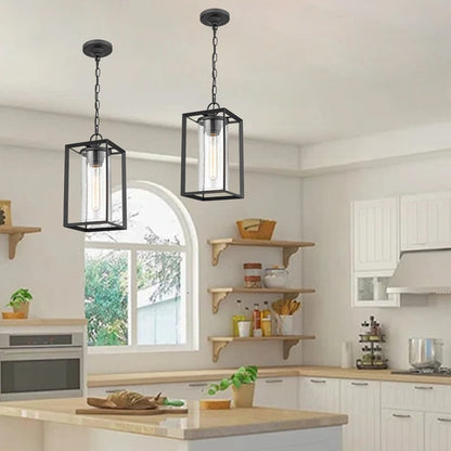 Black pendant lamp with open frame and inner glass cylinder