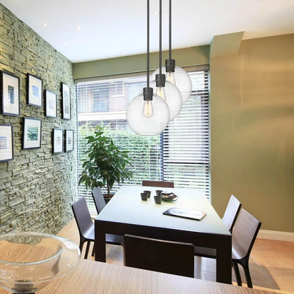 Black pendant lamp with spherical clear glass shade