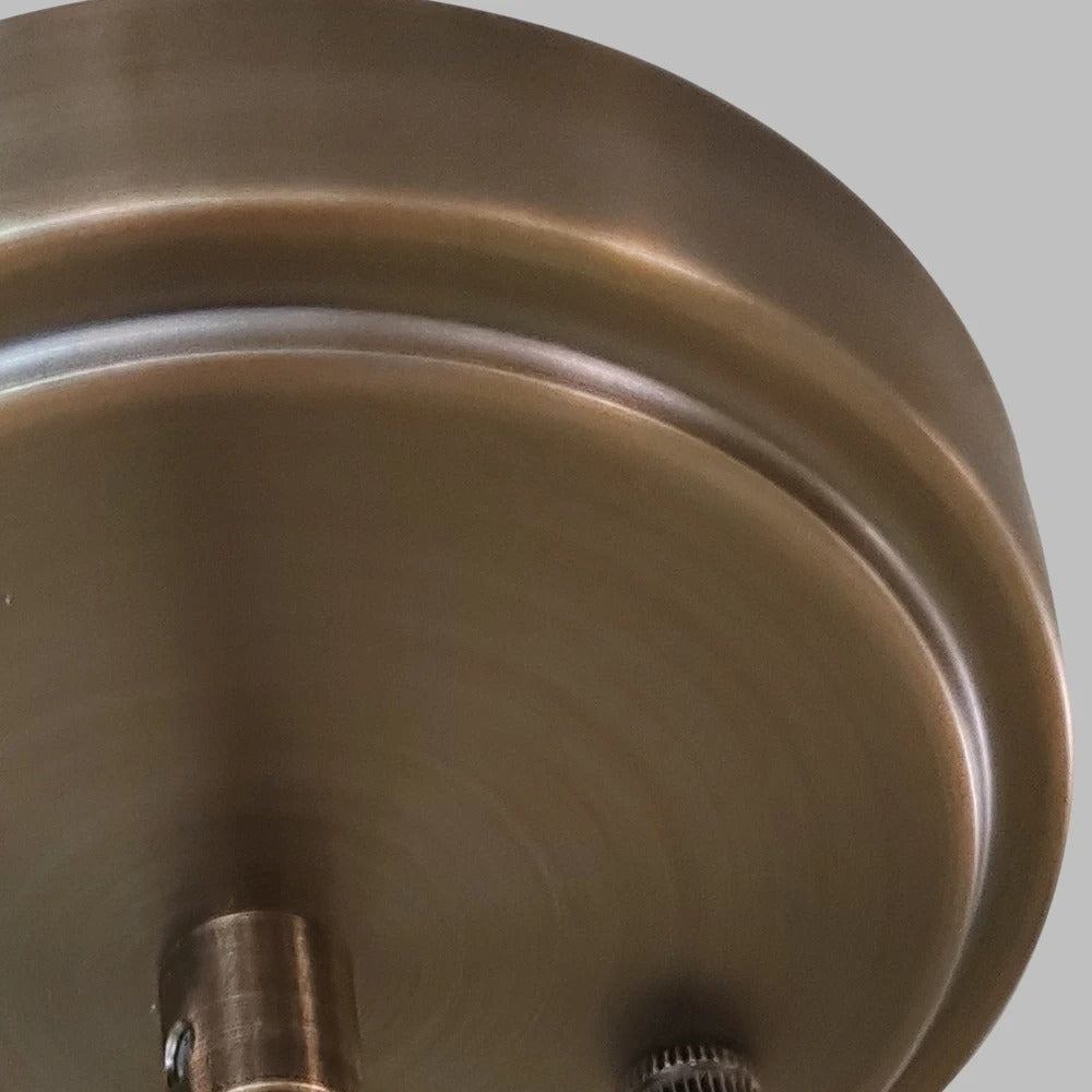 Brass pendant lamp with clear cylindrical glass shade