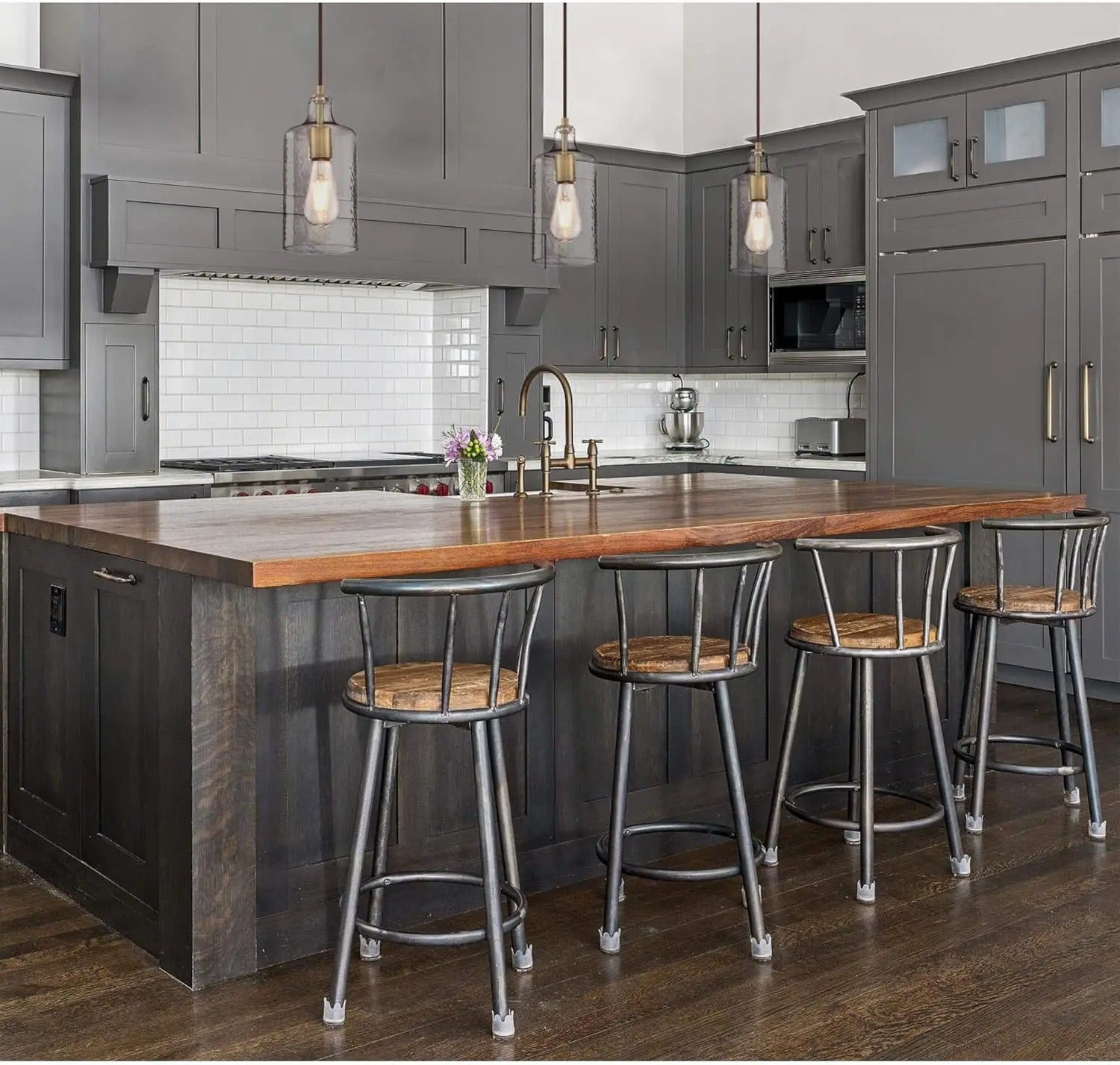 Brass pendant lamp with clear cylindrical glass shade