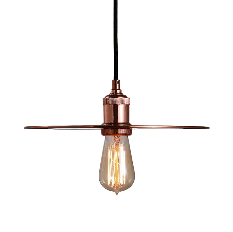 Copper-colored pendant lamp with flat disc detail and exposed bulb