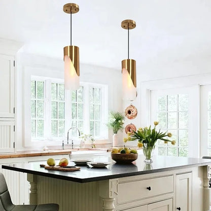 Gold-colored pendant lamp with cylindrical glass shade