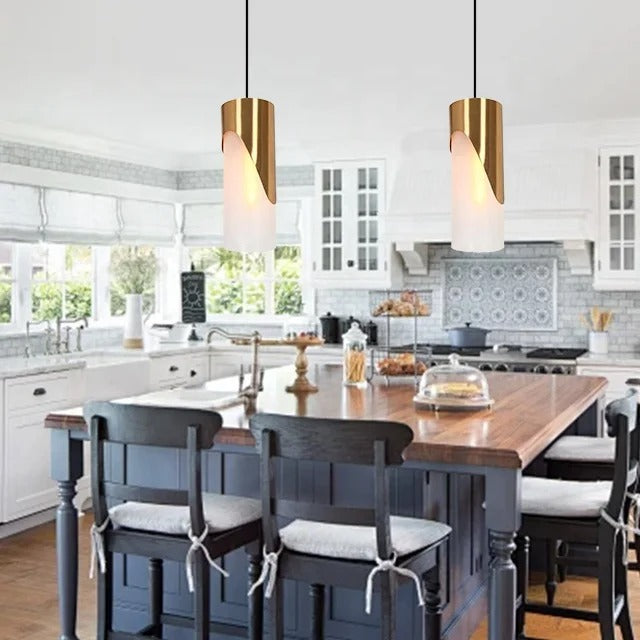 Gold-colored pendant lamp with cylindrical glass shade