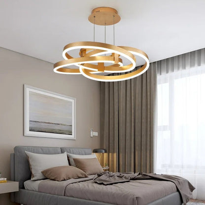 Gold-colored pendant lamp with overlapping circular ring elements