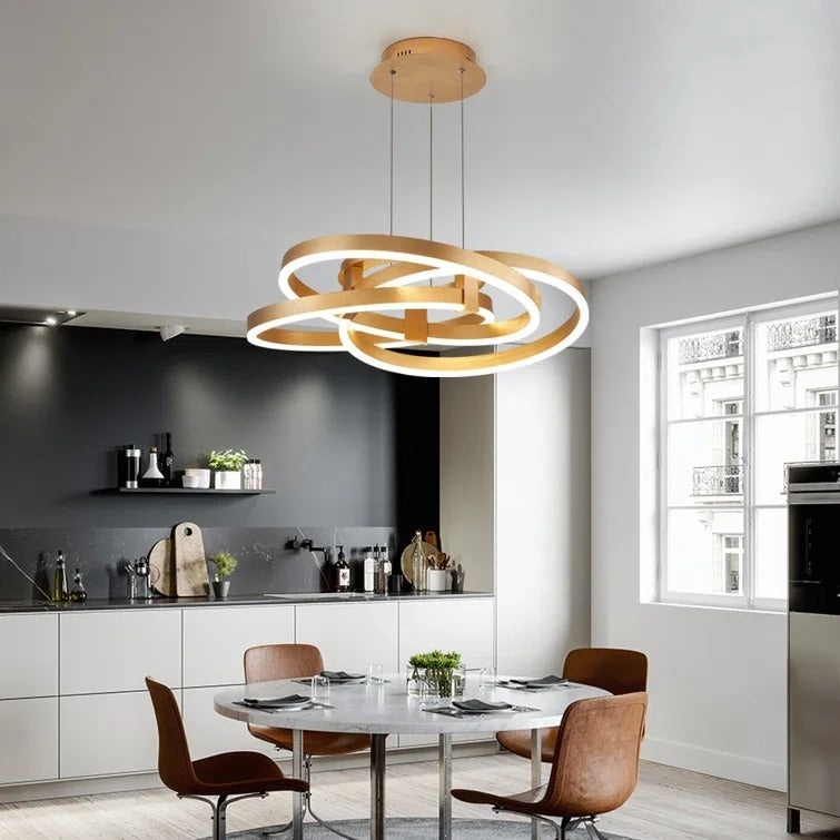 Gold-colored pendant lamp with overlapping circular ring elements