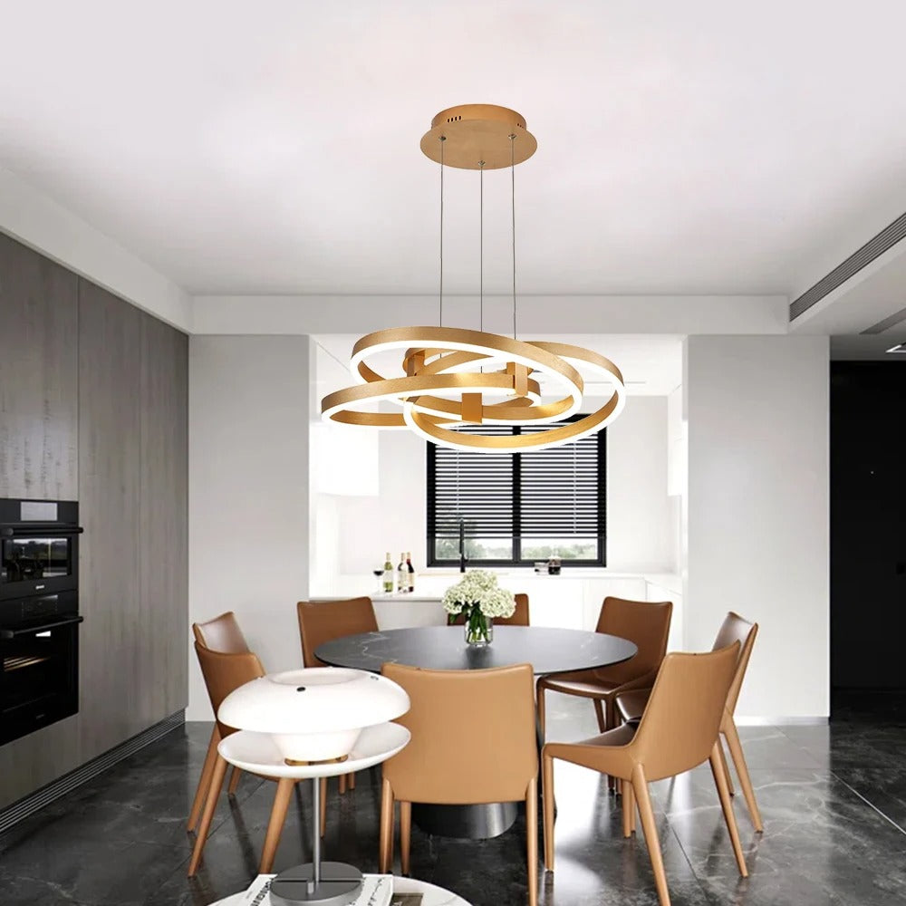 Gold-colored pendant lamp with overlapping circular ring elements